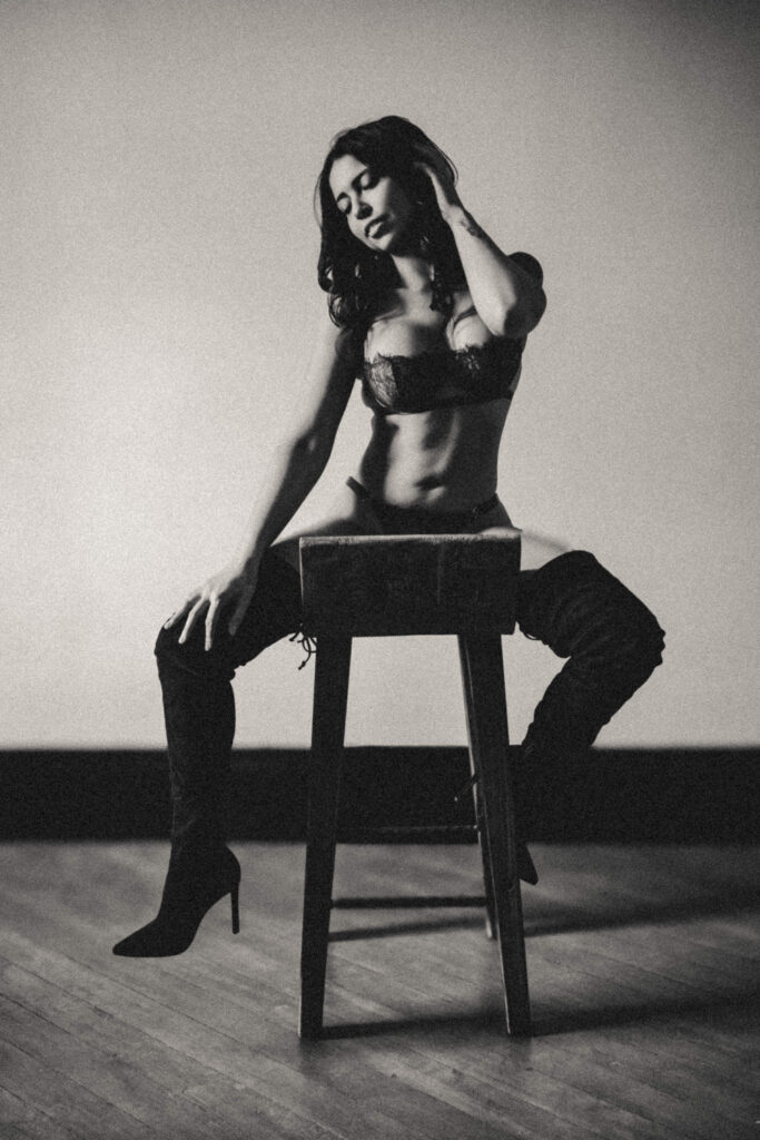 Luxury boudoir portrait celebrating authentic confidence and self-acceptance.